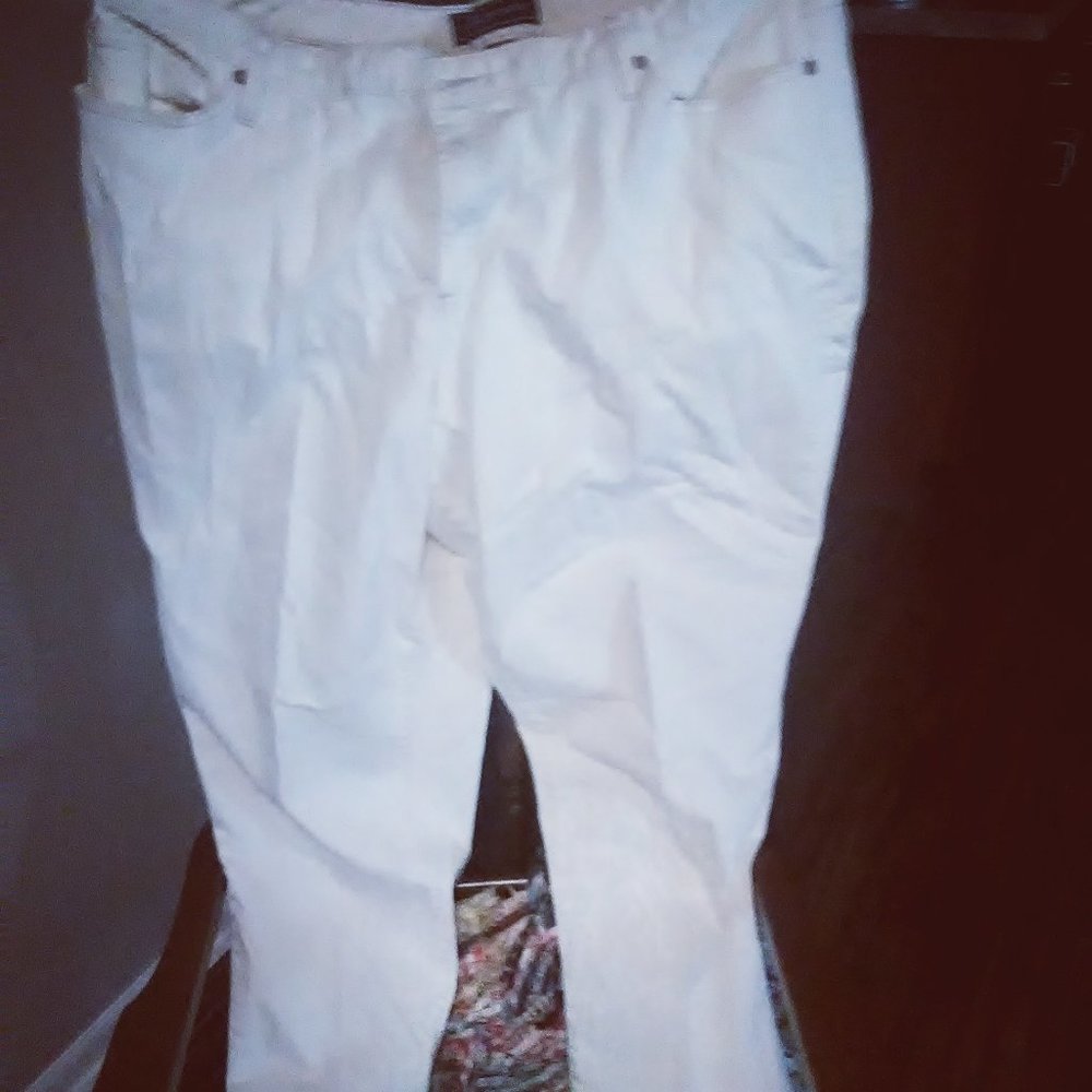 Cream colored straight leg jeans